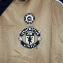 Koszulka Piłkarska Manchester United 2001/2002 100th Anniversary Gold Retro, Beckham, van Nistelrooy, Scholes Koszulka Piłkarska Manchester United 2001/2002 100th Anniversary Gold Retro, Beckham, van Nistelrooy, Scholes