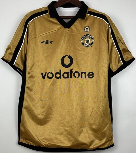 Koszulka Piłkarska Manchester United 2001/2002 100th Anniversary Gold Retro, Beckham, van Nistelrooy, Scholes Koszulka Piłkarska Manchester United 2001/2002 100th Anniversary Gold Retro, Beckham, van Nistelrooy, Scholes