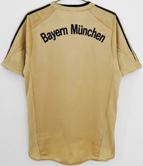 Koszulka Piłkarska Bayern Monachium 2004/2005 Away Gold Retro, Makaay, Ballack Koszulka Piłkarska Bayern Monachium 2004/2005 Away Gold Retro, Makaay, Ballack