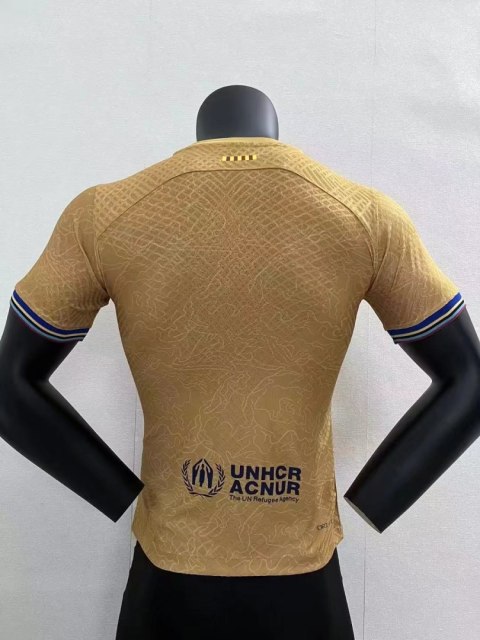 KOSZULKA PIŁKARSKA FC BARCELONA 2022/23 ZŁOTA MECZOWA KOSZULKA PIŁKARSKA FC BARCELONA 2022/23 ZŁOTA MECZOWA